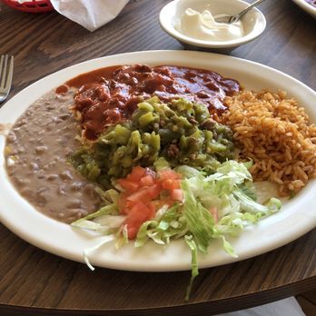 Mary & Tito's - Chicken enchiladas with red and green Chile, beans and rice. - New Mexican Cuisine Near Me - Albuquerque, New Mexico