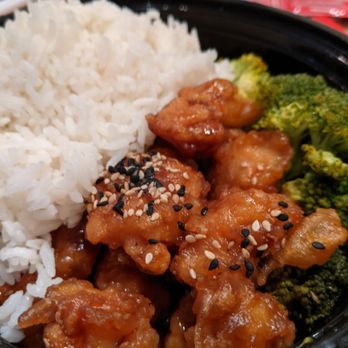 Wasabi Restaurant - Sesame chicken, just combined the rice in same container - Sushi Bars Near Me - Cary, North Carolina Wasabi Restaurant - Sesame chicken, just combined the rice in same container - Sushi Bars Near Me - Cary, North Carolina