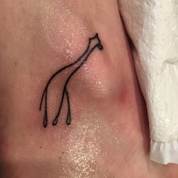Giraffe tattoo - its over my ankle bone, outside right foot! Love it!