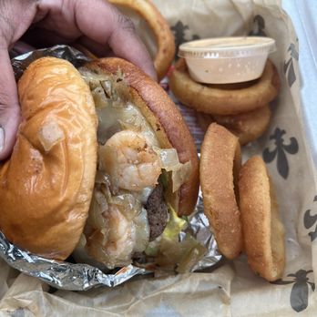 Roul's Deli - Shrimp burger and onion rings. Always hot fresh and right on time! - Burgers Near Me - Baton Rouge, Louisiana
