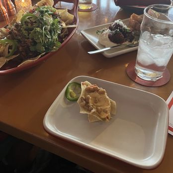 The Arrogant Butcher - Smoked Carnitas Nachos, Butcher's Meatballs with whipped ricotta. Delicious. - American Near Me - Phoenix, Arizona