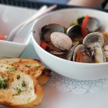 Fins Bistro - Clams in a Curry Sauce - Seafood Near Me - Issaquah, Washington Fins Bistro - Clams in a Curry Sauce - Seafood Near Me - Issaquah, Washington