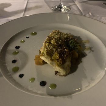 Restaurante del Parador - Roasted Sea bass, nut crust and vegetable alboronia from the Nasrid menu. - Mediterranean Near Me - Granada, GR