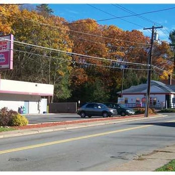 Dunkin' -  a car parked on the side of the road - Donuts Near Me - Port Jervis, New York