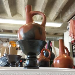 Ethiopian grains, coffee, and coffee pots.