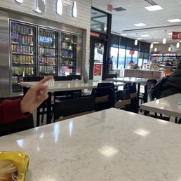 Seating with tables . Very clean Seating with tables . Very clean