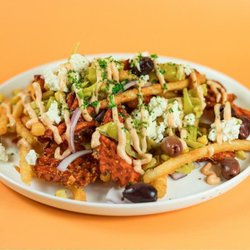 Santorini's - Street Cart Fries at Santorini's Riverton: Sweet potato & regular fries topped with feta, roasted corn, and Doner Aioli.