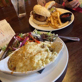The Pub - Shepherds pie and crispy chicken sandwich with rotten salad. - Pubs Near Me - Nashville, Tennessee The Pub - Shepherds pie and crispy chicken sandwich with rotten salad. - Pubs Near Me - Nashville, Tennessee