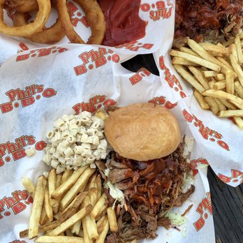 Phil's BBQ - Pulled pork sandwiches with fries, pasta salad, and onion rings on the side - Barbeque Near Me - San Diego, California Phil's BBQ - Pulled pork sandwiches with fries, pasta salad, and onion rings on the side - Barbeque Near Me - San Diego, California