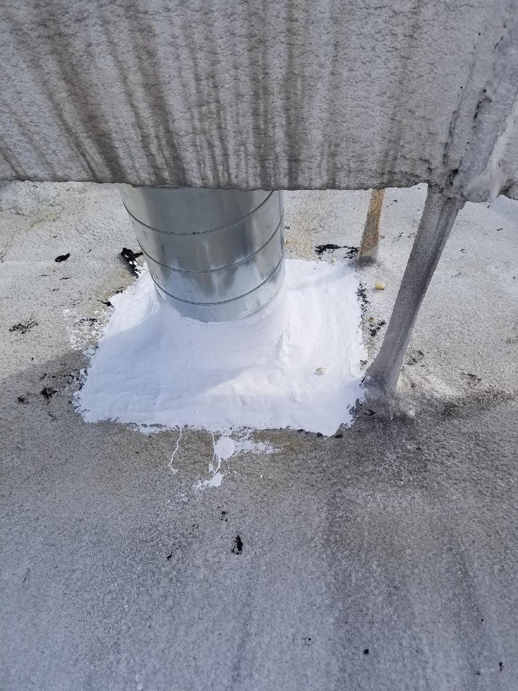 Slide of Huncho Roofer