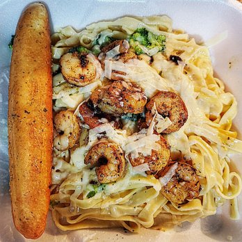 Applebee's Grill + Bar - Broccoli Blackened Shrimp Pasta with golden brown bread sticks. - Sports Bars Near Me - Plant City, Florida