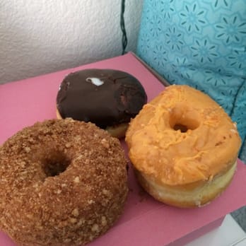 Doughboys Donuts - Angel cream, orange glazed, crumb raised (I already ate the coconut raised it's my fav) - Donuts Near Me - Reno, Nevada Doughboys Donuts - Angel cream, orange glazed, crumb raised (I already ate the coconut raised it's my fav) - Donuts Near Me - Reno, Nevada