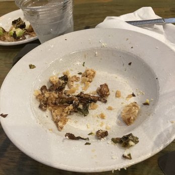 Mad Cow Grill - What was left of the brussel sprouts...they were good! - American Near Me - Laurel, Maryland Mad Cow Grill - What was left of the brussel sprouts...they were good! - American Near Me - Laurel, Maryland