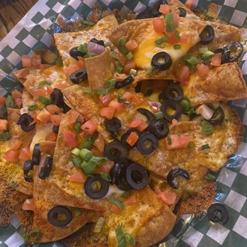 Magpie & Stump Restaurant - Nachos - Mexican Near Me - Banff, Alberta Magpie & Stump Restaurant - Nachos - Mexican Near Me - Banff, Alberta