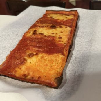 Lazzara's Pizza Cafe - Half a cheese pie - Pizza Near Me - New York, New York Lazzara's Pizza Cafe - Half a cheese pie - Pizza Near Me - New York, New York