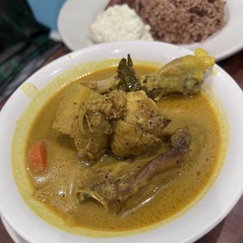 The Blue Hole Restaurant Belizean Caribbean Cuisine - Curry Chicken with rice, potato salad and plantains - Caribbean Near Me - Gardena, California
