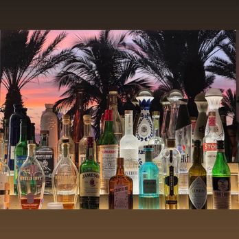 Rufa - Reflection of the sunset at the bar. - Cocktail Bars Near Me - Sarasota, Florida