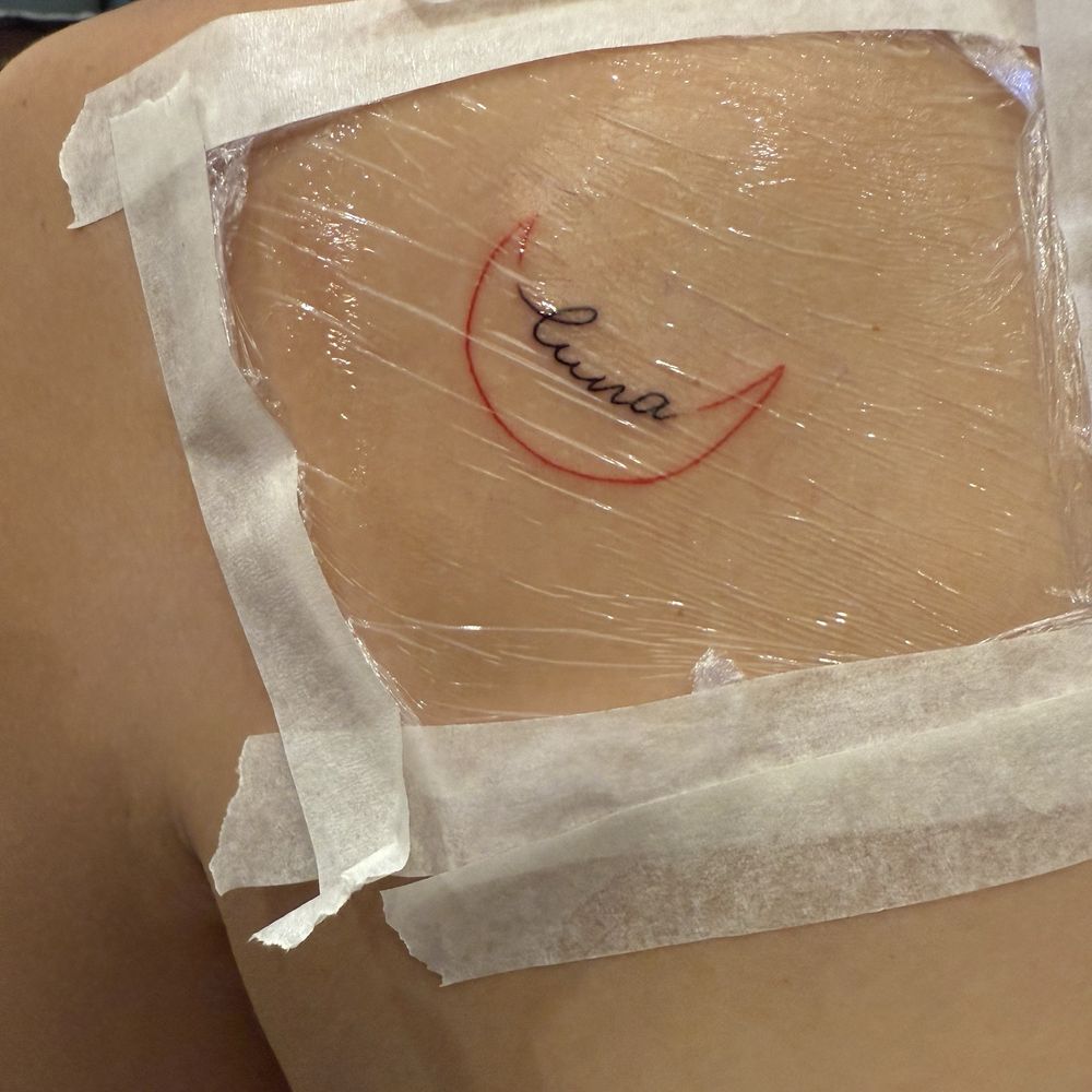Beautiful Lady Tattoo - Red Moon w/ Black lettering - Piercing Near Me - Barcelona, B