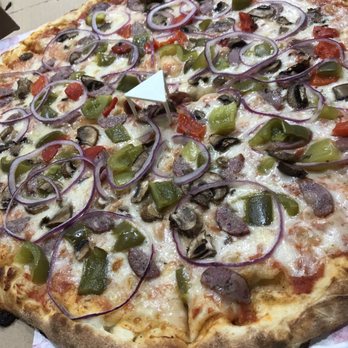 Flat Earth Pizza - Extra large personalized pizza. - Pizza Near Me - Carson City, Nevada
