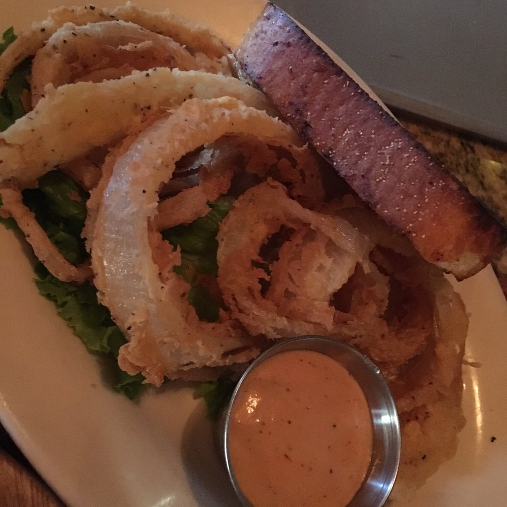 Kennel Club Steakhouse - Hand cut onion rings with comeback sauce - Steakhouses Near Me - Grenada, Mississippi Kennel Club Steakhouse - Hand cut onion rings with comeback sauce - Steakhouses Near Me - Grenada, Mississippi