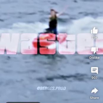 Five Guys - a man on a surfboard in the water - Burgers Near Me - Tucker, Georgia Five Guys - a man on a surfboard in the water - Burgers Near Me - Tucker, Georgia