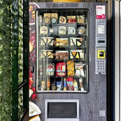 Cured And Cultivated - Running and needing something special. Out in front, they have an awesome cheese vending machine. How thoughtful is that!