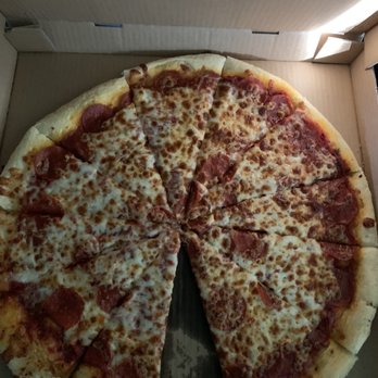 Ma Ma Olivia's Pizzeria - XL Pepperoni pizza minus the slice one of the kids grabbed before I could get a pic. - Pizza Near Me - Aurora, Colorado
