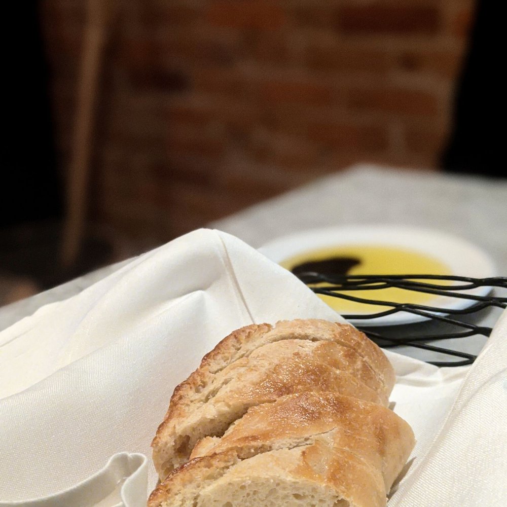 Mizuna - Complimentary between-meal bread with garlic olive oil and vinegar - New American Near Me - Spokane, Washington