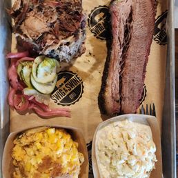 Brisket ,pulled pork with coleslaw and corn pudding Brisket ,pulled pork with coleslaw and corn pudding