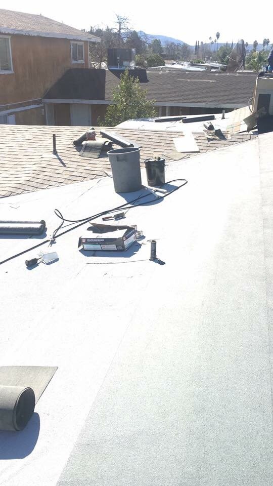 Slide of Tony and Velasco Roofing Constructions