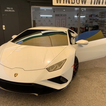 Grand Tint Auto - Ceramic film installation for the Lambo - Car Window Tinting Near Me Grand Tint Auto - Ceramic film installation for the Lambo - Car Window Tinting Near Me