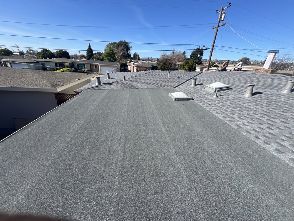 Slide of Kingbee Roofing