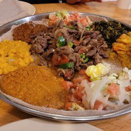 Vegetarian combo and Beef tibs. Vegetarian combo and Beef tibs.