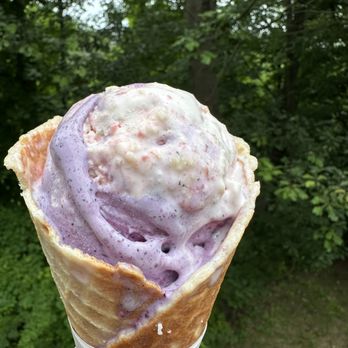 Nicholas Creamery - a hand holding a cone of ice cream - Ice Cream & Frozen Yogurt Near Me - Tinton Falls, New Jersey Nicholas Creamery - a hand holding a cone of ice cream - Ice Cream & Frozen Yogurt Near Me - Tinton Falls, New Jersey