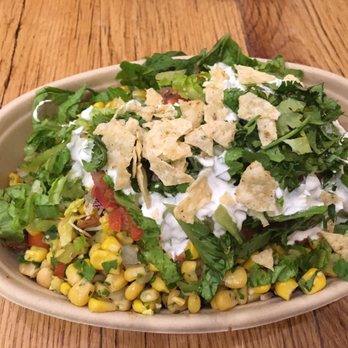 Good Burrito - a bowl of salad on a wooden table - Mexican Near Me - Elizabethtown, Pennsylvania Good Burrito - a bowl of salad on a wooden table - Mexican Near Me - Elizabethtown, Pennsylvania