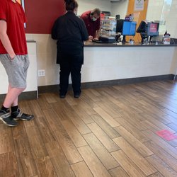 Wendy's - Manager on phone.