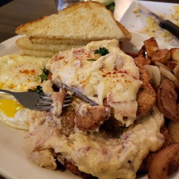 Hash - Chicken Fried Steak with bacon gravy, eggs and potatoes. - Breakfast & Brunch Near Me - Olympia, Washington Hash - Chicken Fried Steak with bacon gravy, eggs and potatoes. - Breakfast & Brunch Near Me - Olympia, Washington