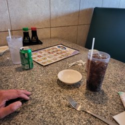Sushi Cuisine - Can sodas.