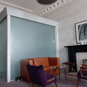 The Crown Plaza - Toilet room behind couch. - Hotels Near Me - Edinburgh, EDH