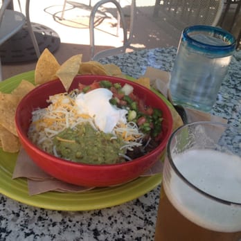 Dos Coyotes Border Cafe - Border Burrito Bowl + a beer, sitting under an umbrella on a sunny day... Life is GOOD - Mexican Near Me - Folsom, California