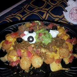 Taco John's - Some crazy tater tot deliciousness del grande something. Taco Johns, Kearney. Yum!