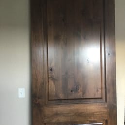 Stained alder wood door with glaze.