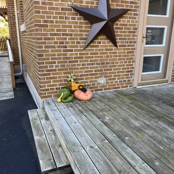 Baileys Harbor Schoolhouse Inn - Fall decor outside a guest room. - Hotels Near Me - Baileys Harbor, Wisconsin Baileys Harbor Schoolhouse Inn - Fall decor outside a guest room. - Hotels Near Me - Baileys Harbor, Wisconsin