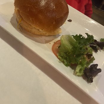 BK9 - This was the uneaten burger with ALL the topping we asked not to be included. - Caribbean Near Me - Brooklyn, New York