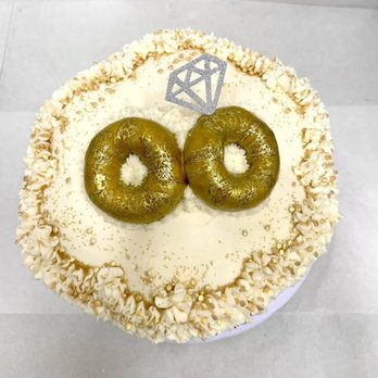 Dip and Sip Donuts - Decorated pumpkin donut cake for custom wedding cake - Donuts Near Me - Glenview , Illinois Dip and Sip Donuts - Decorated pumpkin donut cake for custom wedding cake - Donuts Near Me - Glenview , Illinois