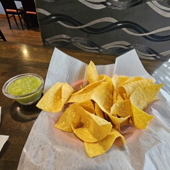 La China Poblana - Complimentary chips with a green avocado/cilantro sauce - Mexican Near Me - Clearwater, Florida
