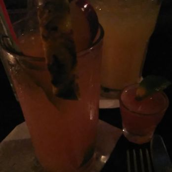 MangoSeed Restaurant - Rum PUnch - Complimentary shot and pineapple juice - Caribbean Near Me - Brooklyn, New York MangoSeed Restaurant - Rum PUnch - Complimentary shot and pineapple juice - Caribbean Near Me - Brooklyn, New York