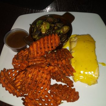 Gather - Salmon with sweet potato fries and brussel sprouts - American Near Me - Lewiston, New York