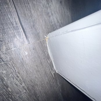 Moreno Framing And Carpentry - Trying to cover huge gaps between the flooring and the door casing couldn't align to connecting flooring planks - General Contractors Near Me