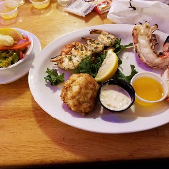 Buddy's Crabs & Ribs - Seafood Trio with seasonal vegatables - Seafood Near Me - Annapolis, Maryland Buddy's Crabs & Ribs - Seafood Trio with seasonal vegatables - Seafood Near Me - Annapolis, Maryland